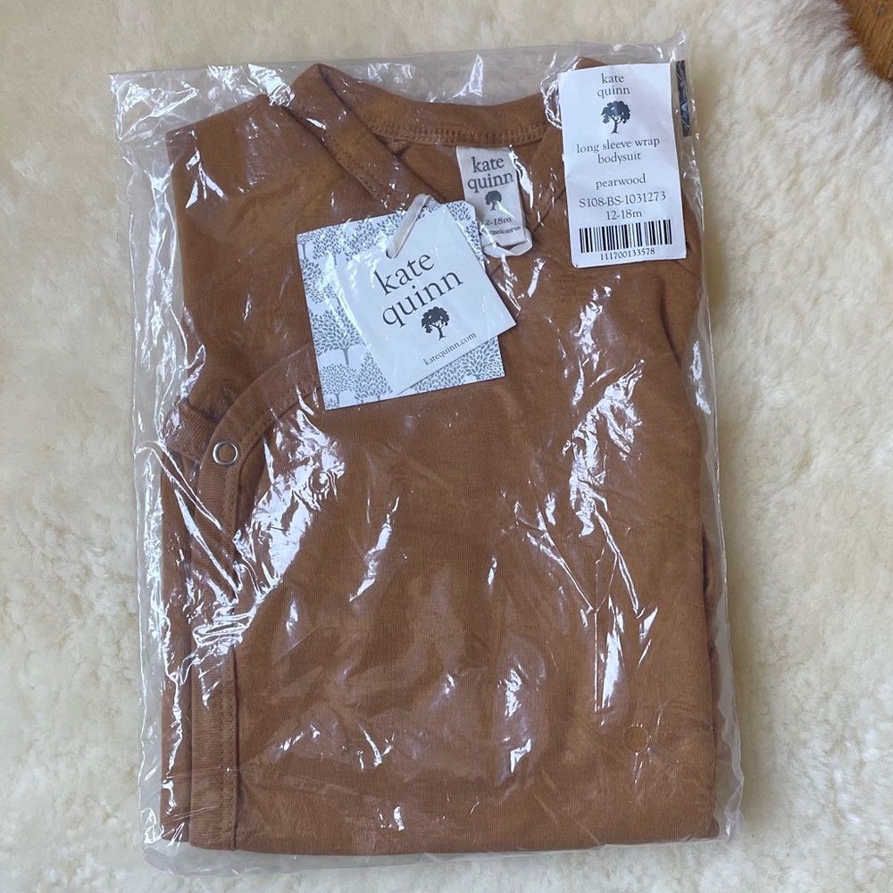 Kate Quinn long sleeve wrap bodysuit